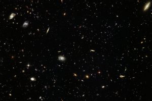 Hubble photo of a tiny dark patch revealing billions of galaxies