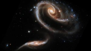The larger galaxy in the UGC 1810 - UGC 1813 pair has a mass that is about five times that of the smaller galaxy. Both are so vast. How are we connected? You and I?